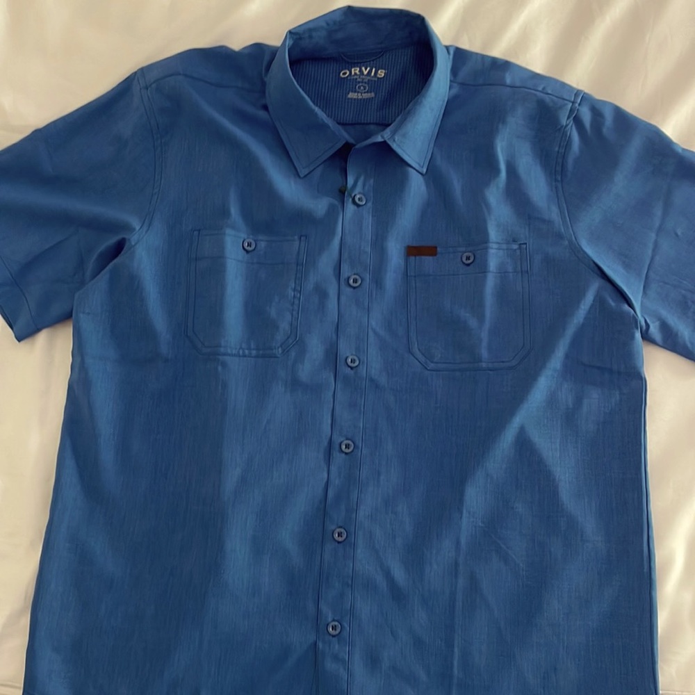 Orvis short sleeve tech shirt in blue. Light weight quick dry fabric. UPF 30+.